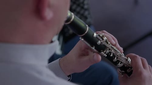 Musician Playing Clarinet From OvertheShoulder View
