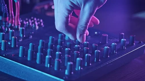 Adjust Volume Controls on the Audio Mixer in Neon Light CloseUp