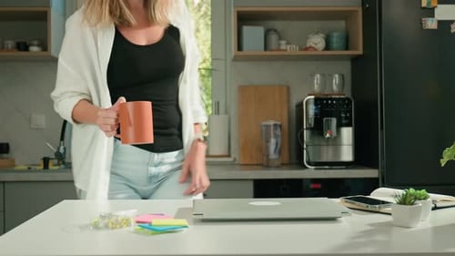 Woman is Starting Working Day at Home Office Open Laptop