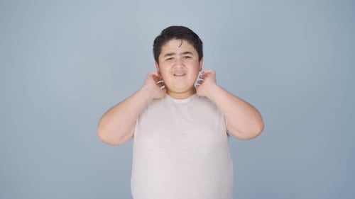 Boy with itchy ears.