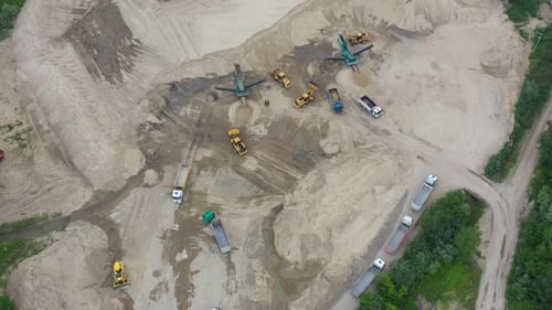 Aerial view loading bulldozer in open air quarry. Sand mining industry. Bulldozer machine. Crawler b
