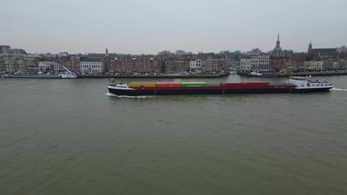 Rulica Inland, Motor Freighter Vessel Sailing In The River Along The Dordrecht City In Netherlands.