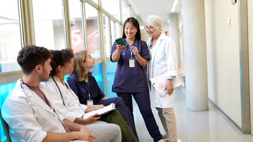 Medical Professionals Discuss Healthcare in Hospital Setting