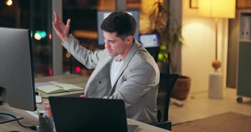 Frustrated, business man and throw paper at office at night with corporate deadline and burnout