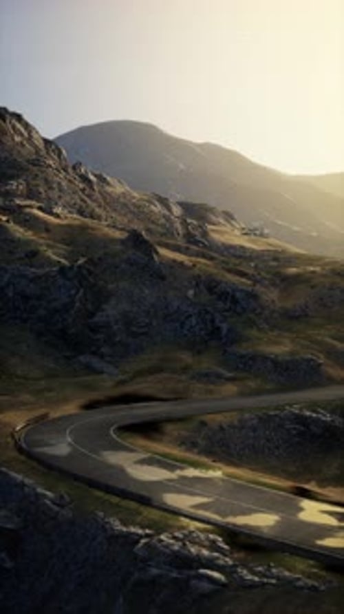 Twisting Road Through Scottish Mountain Range