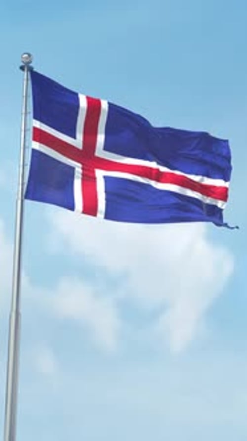 Icelandic National Flag Waving Proudly Against Clear Blue Sky