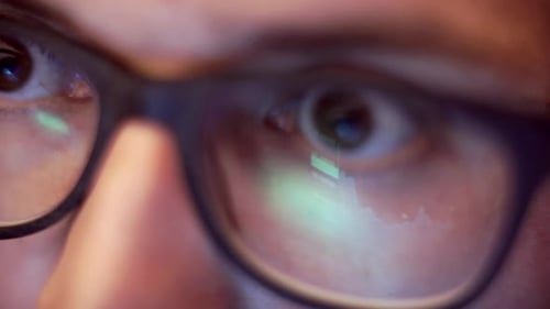 Close Up View of Focused Businessman Wears Computer Glasses