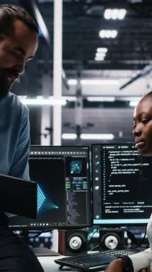 Vertical Video Data Center Engineering Team Collaborating on Neural Network Development