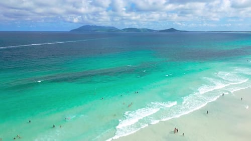 Aerial View of Caribbean Beach with Crystal Clear Blue Water and White Sand