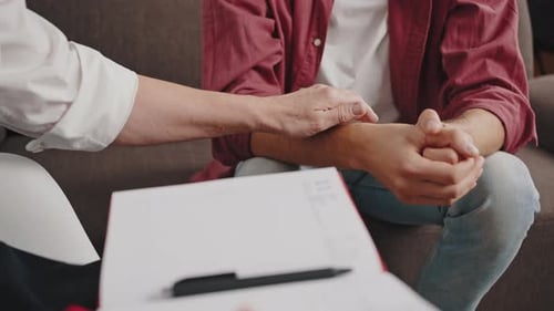 Supportive Touch During Counseling Session