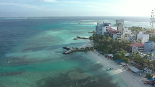 Drone photo of waves. The Maldives on a sunny day