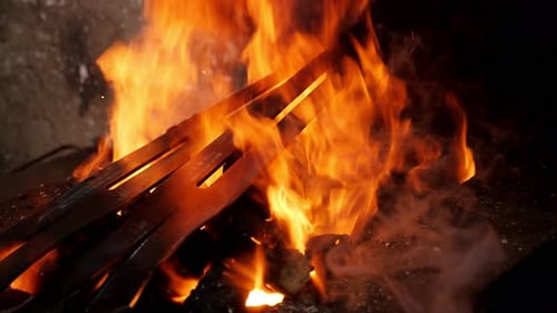 Hot Metal in a Roaring Fire