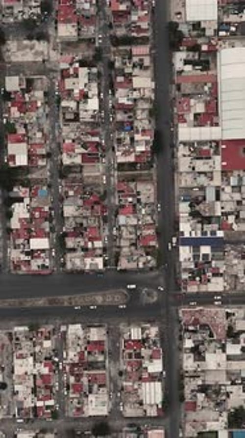 Vertical drone shot showcasing the urban landscape of Ecatepec