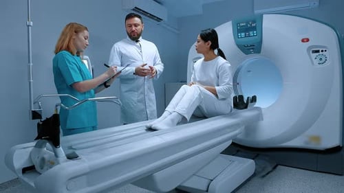 Patient Being Prepared for CT Scan by Doctors