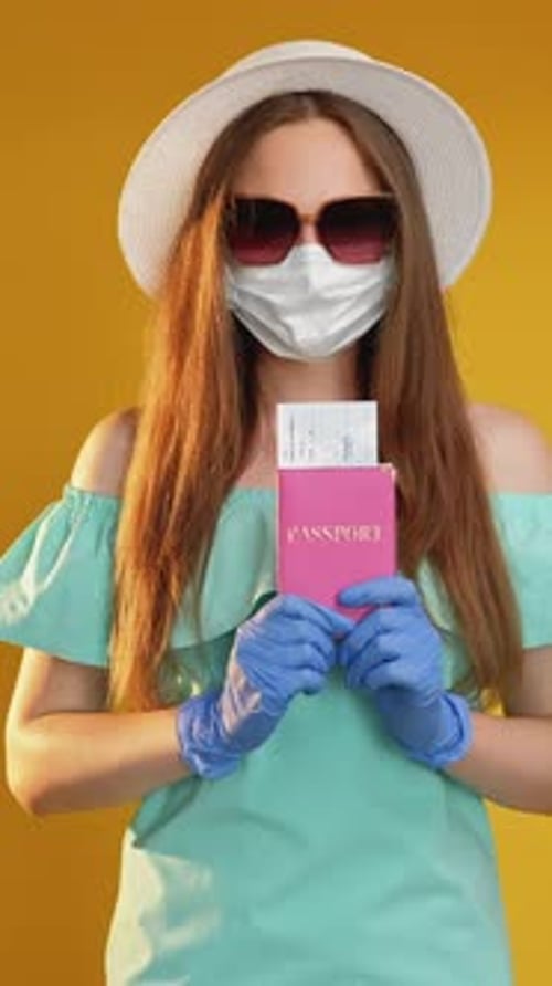 Woman with Passport, Masked for Travel