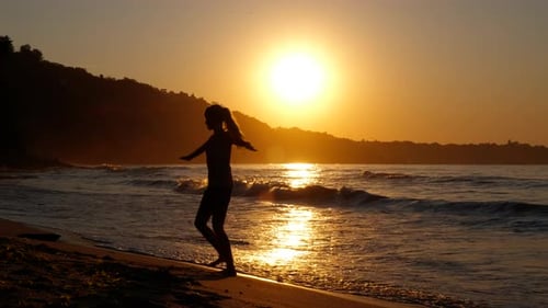 Silhouette of Girl Artist Against Sea