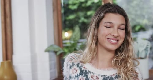 Young Woman Smiling at Home Close Up