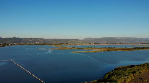 Lagoon of Kune natural habitat of fish living on shallow salt water filled by tide where fishermen p