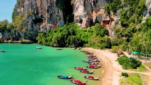 Exploring the Breathtaking Beaches and Vibrant Boats of Krabi Thailand