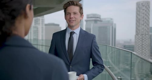 Business People at Conference Meeting and Shaking hands on Office Rooftop