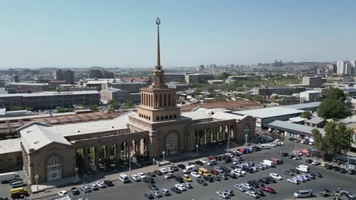 Aerial flight toward tall spire atop Railway Station, Yerevan, Armenia