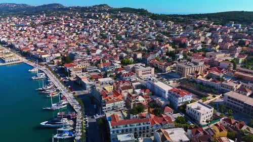 Beautiful aerial view of a crowded Mediterranean harbor town and colorful city