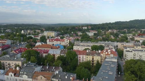 Drone Flyover Moving Forward Across Residential Buildings in Krakow, Poland