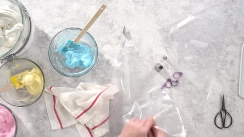 Time Lapse Flat Lay Step By Step Transfering Meringue Mix Into Piping Bags with Metal Tips to Bake