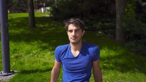 Physically disabled young man on the street.