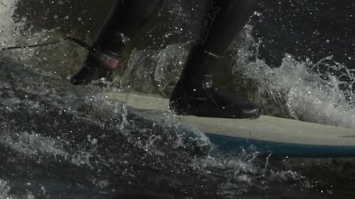 extreme close up feet on surf board slow motion.mov