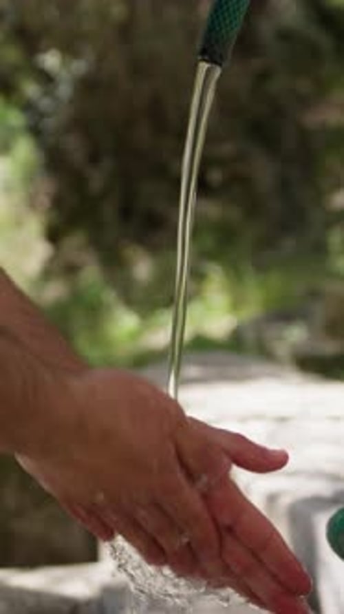Boy Washes His Hands In A Fountain Of A Calabrian Village