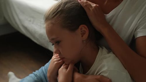 Comforting Child: Gentle Touch and Support at Home