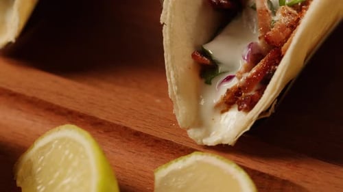 Close-Up of Delicious Tacos and Fresh Lemon