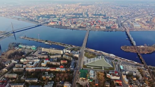 Riga Cityscape and Major Landmarks Reflected in Calm Daugava River Panorama
