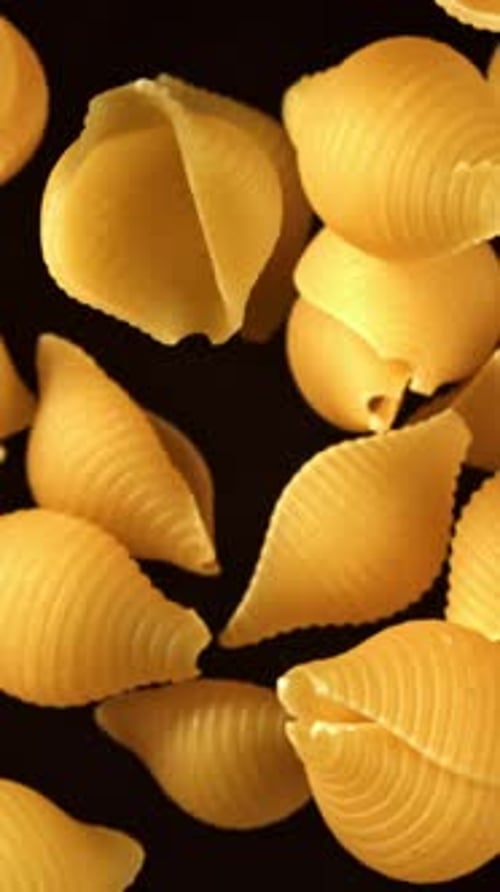 Super Slow Motion Flying Dry Conchiglie Pasta Filmed on a Highspeed Camera at 1000 Fps
