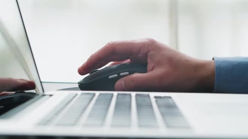 Close Up of Businessman Using Mouse of Computer
