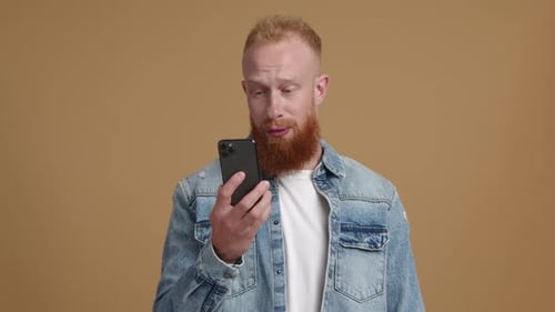 Man Talking on Mobile Phone Video Call