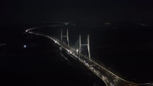 Drone Flight Over Suspension Cable Bridge Towers and Cars Driving Highway Over Wisla River in Warsaw