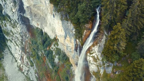 Majestic Waterfall Cascading Down a Rocky Cliffside