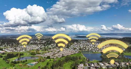 Aerial view of Big Data connecting residential neighborhoods below.