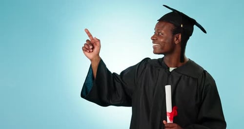 Graduate, education and hand pointing by man in studio with checklist, timeline