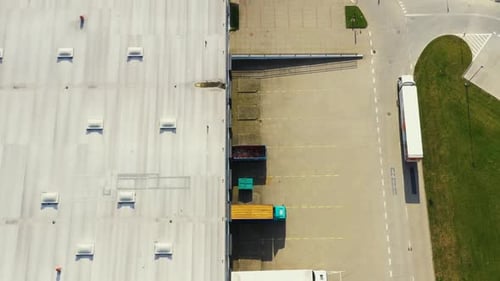 Aerial Bird s Eye View of Trucks at Logistics Loading Docks