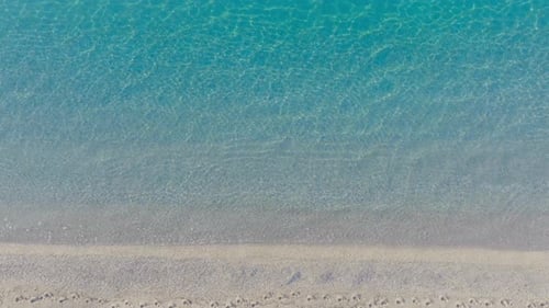 Aerial View of Tropical Beach and Turquoise Water