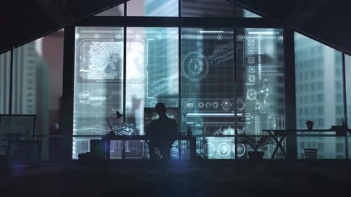 Arbeiten mit einer futuristischen Datenverarbeitungsschnittstelle in einem modernen Büro