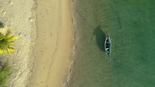 Aerial view of boat near beach, Mozambique.