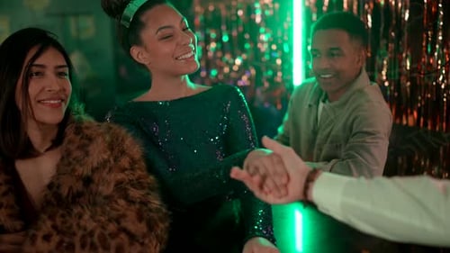 Group of Friends Celebrating New Year at Party