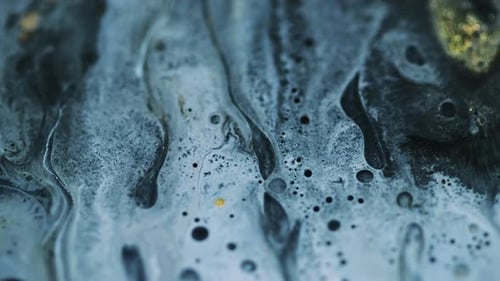 Abstract Liquid with White Streams and Black Bubbles