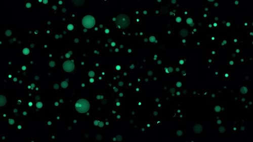 Glowing Green Spheres Floating in Abstract Background
