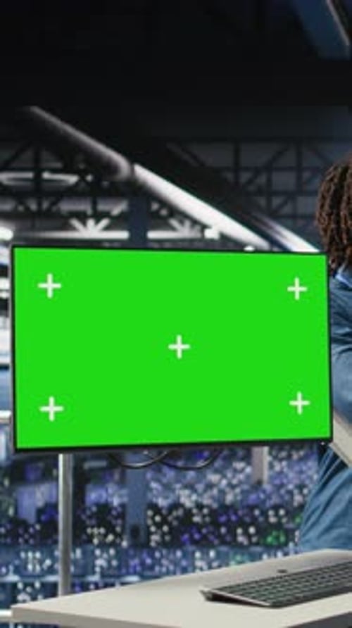 Vertical Video Data Center Engineering Team Coding on Green Screen PC Monitoring AI Systems