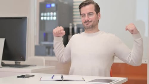 Middle Aged Man Feeling Upset while Reading Contract in Office